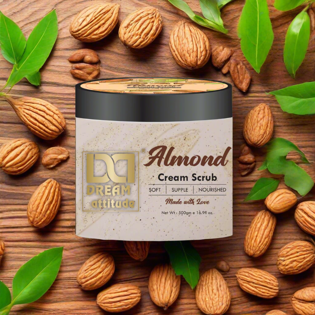 Natural Exfoliating Scrub by Dream Attitude with an almond-inspired background, emphasizing its nourishing cream scrub properties.